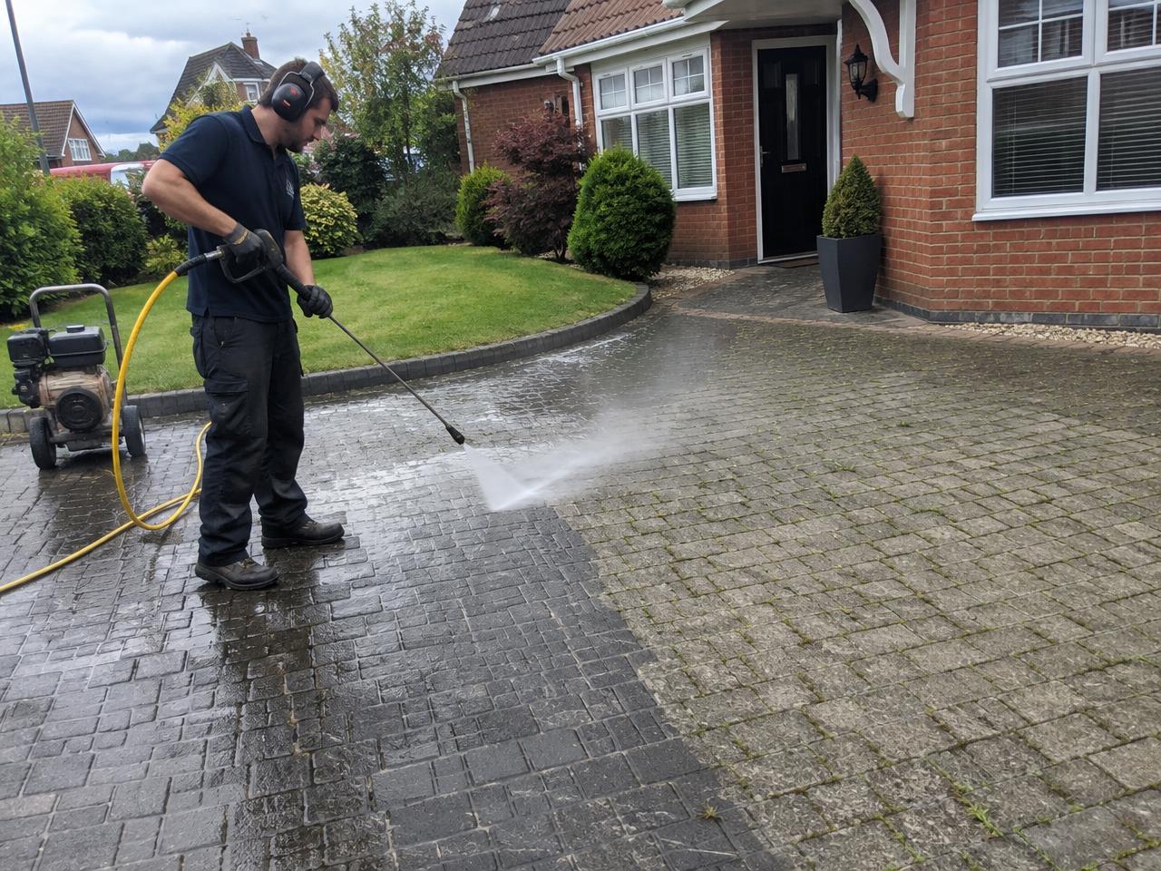 Pressure washing a block paved driveway